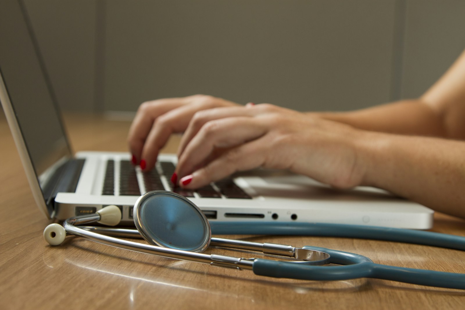 Healthcare and insurance concept, stethoscope on desk